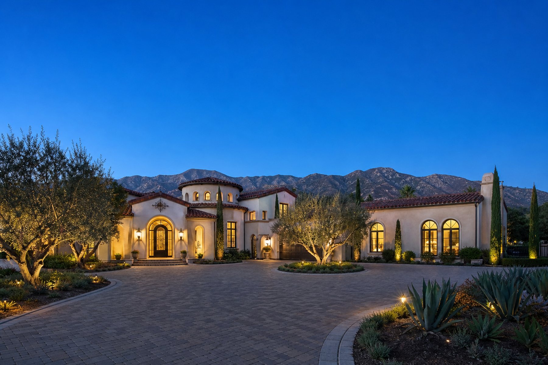 Illustrative concept image, not a real property: a Mediterranean style estate at twilight below the San Gabriel foothills, in the style of Claremont and Rancho Cucamonga luxury homes
